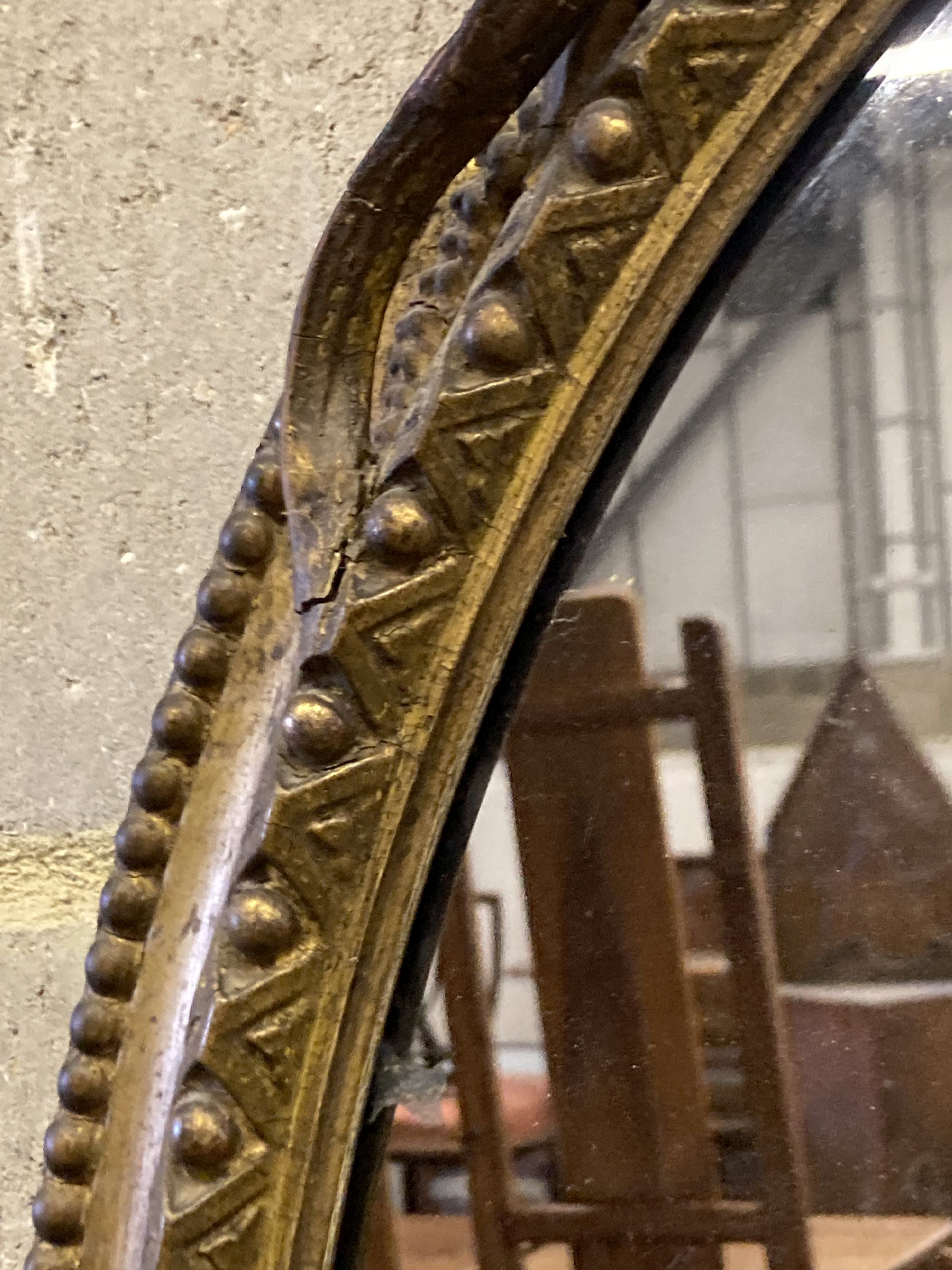 A Victorian giltwood and composition oval wall mirror, width 56cm, height 88cm